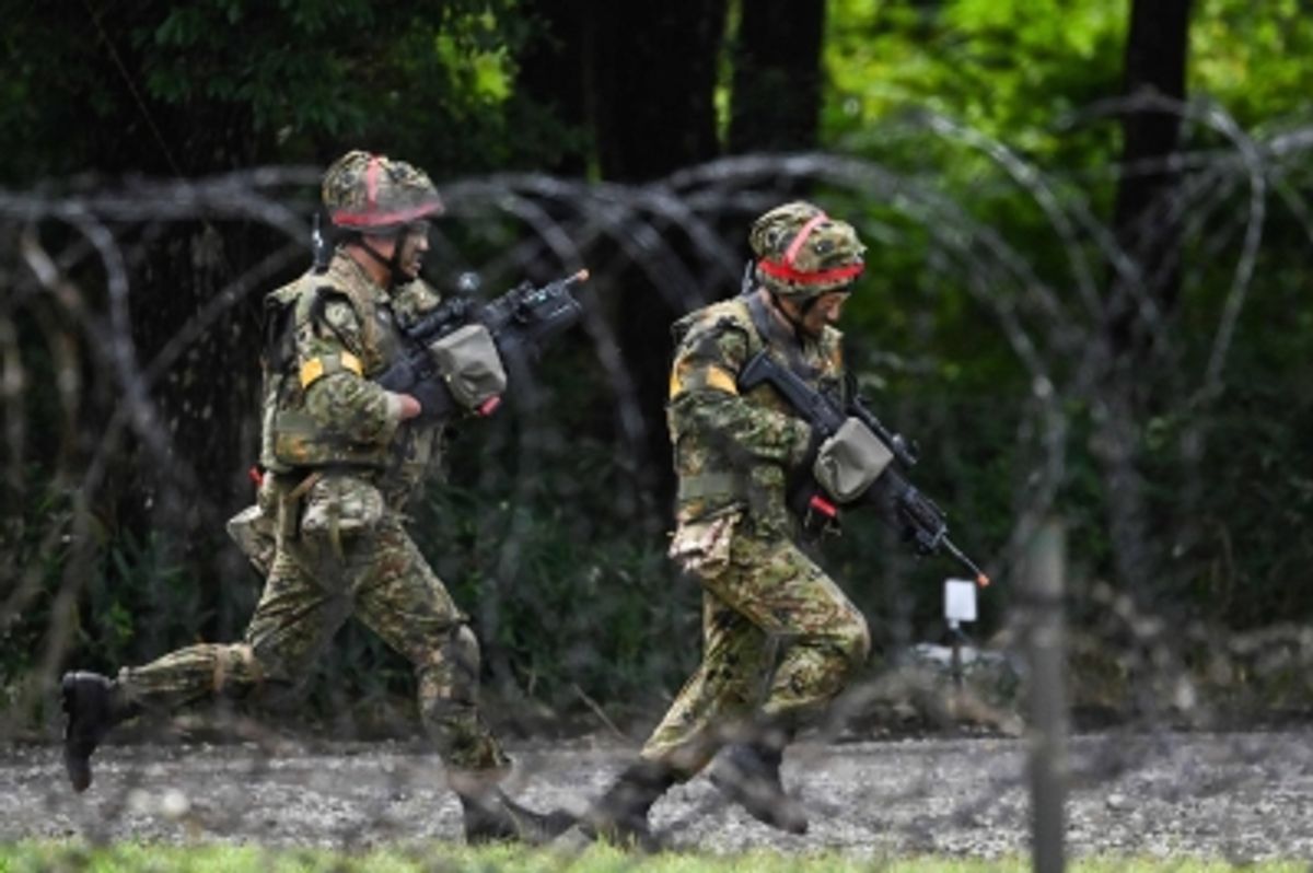 防衛相、外国人による自衛隊採用の考えを否定